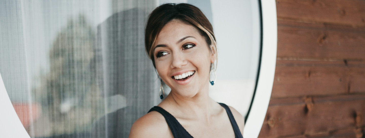 Young woman looking happy and at ease